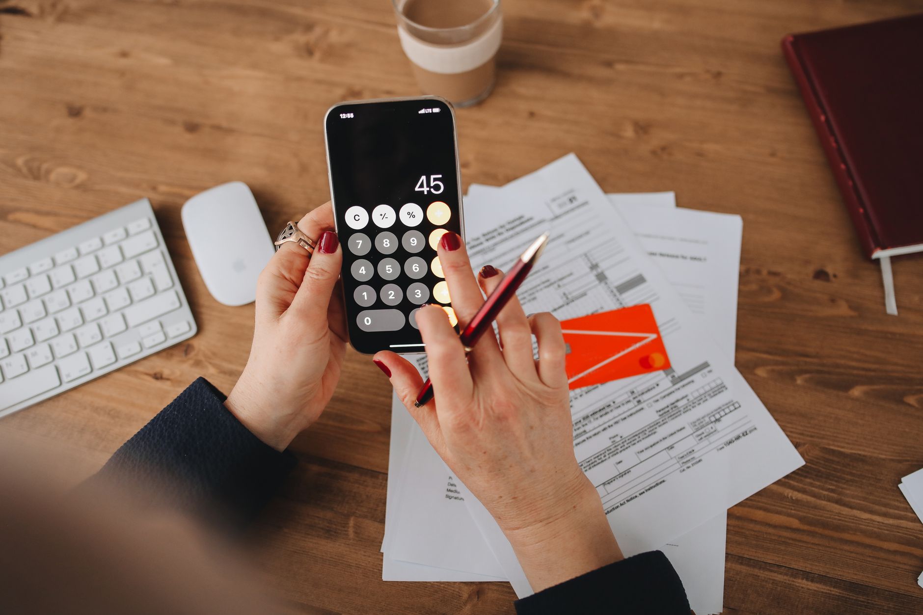 재산세 - person checking property tax notice on smartphone