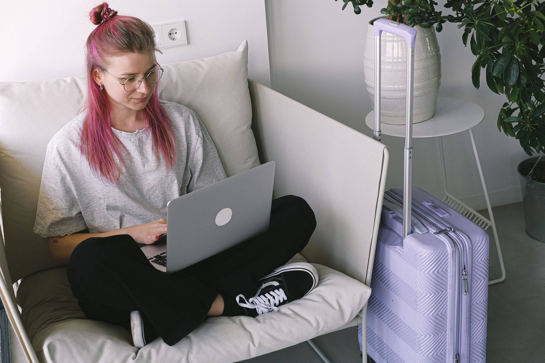 IHG Best Price Guarantee: everything you need to know - person booking hotel on laptop