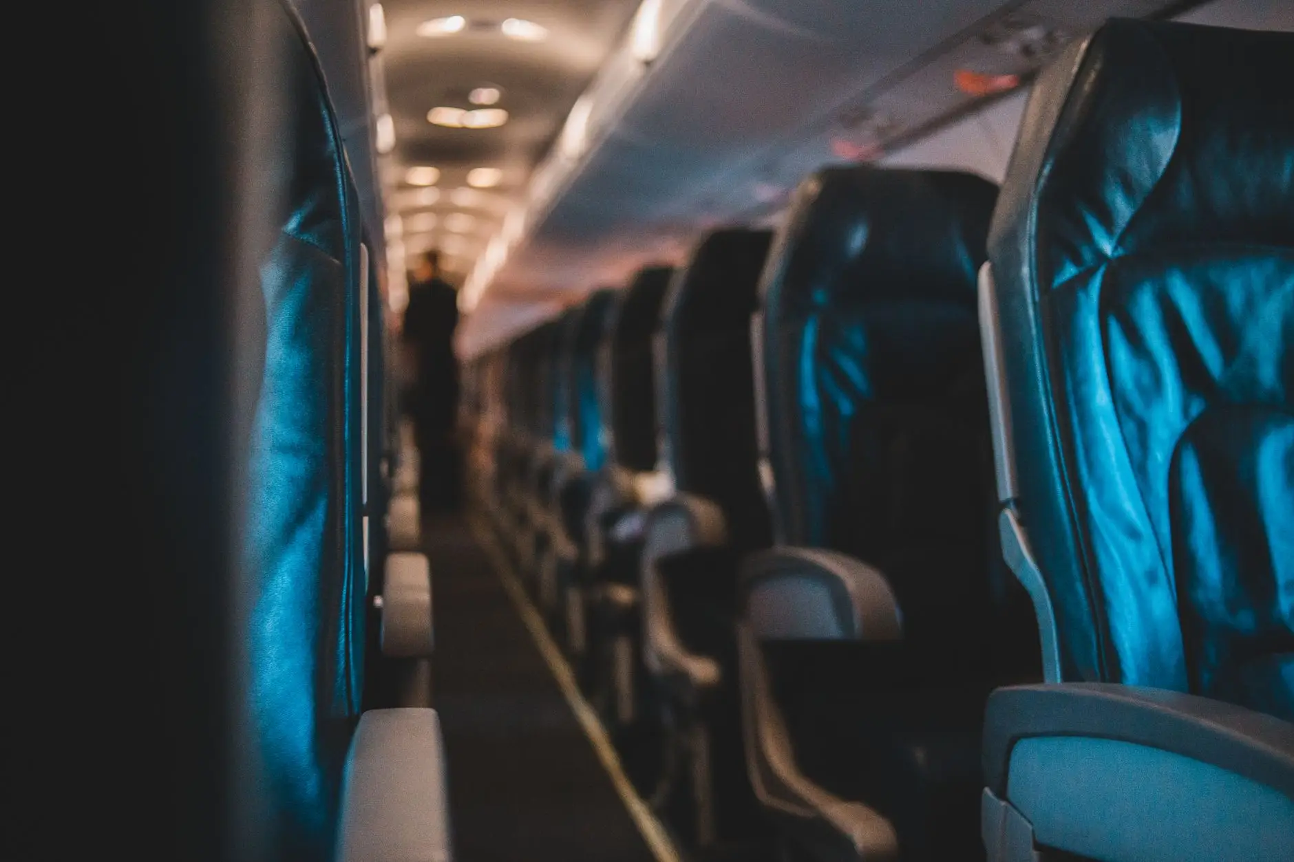 American Airlines Eliminating “Premium” First Class… Probably In 2027? - business class airline seat with sliding door